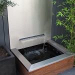 waterelement waterval RVS rivius tuinontwerp patiotuin